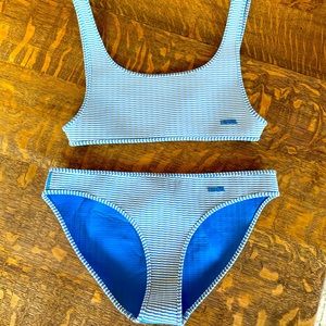 Triangl neoprene bikini.  Medium bottoms.  Small top.